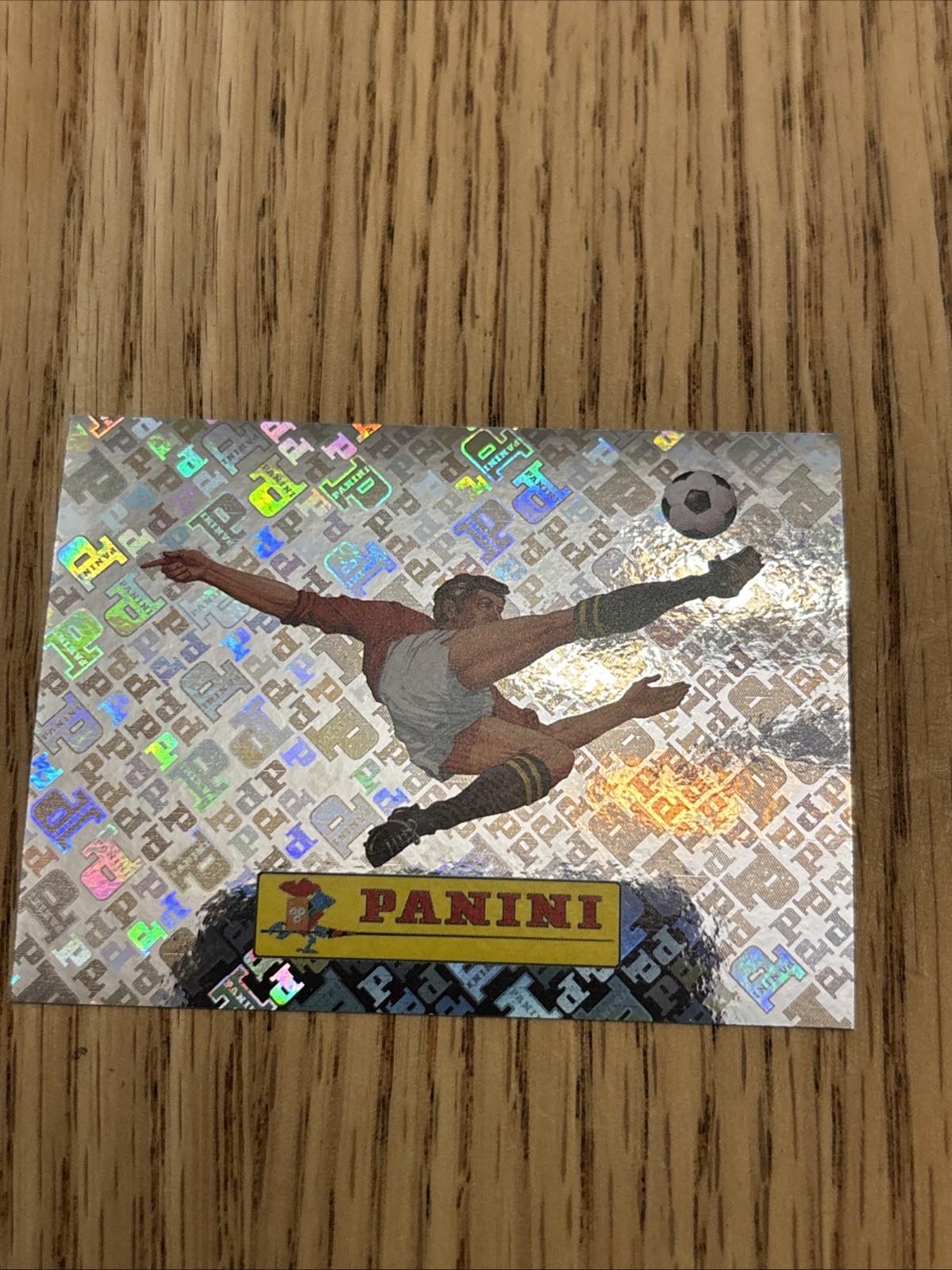 2026 Panini FIFA World Cup Sticker 00 Panini Logo FOIL FWC00